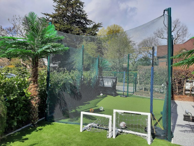 Artificial grass sports area for netball and golf